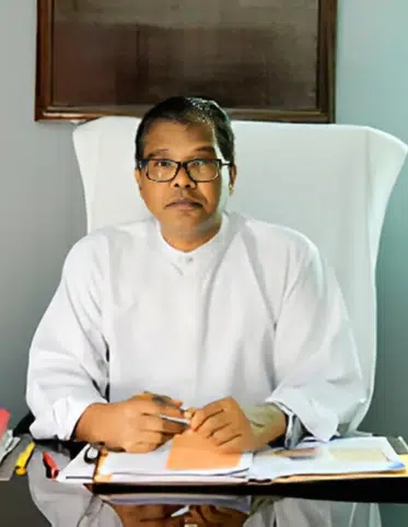 Fr. (Dr.) Lalit P. Tirkey, SJ - Principal, North Bengal St. Xavier's College
